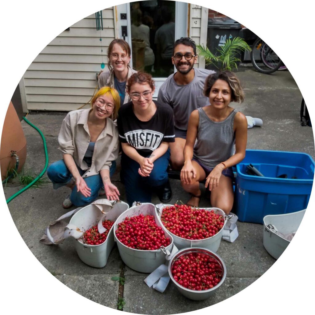 Group of people with baskets of berries